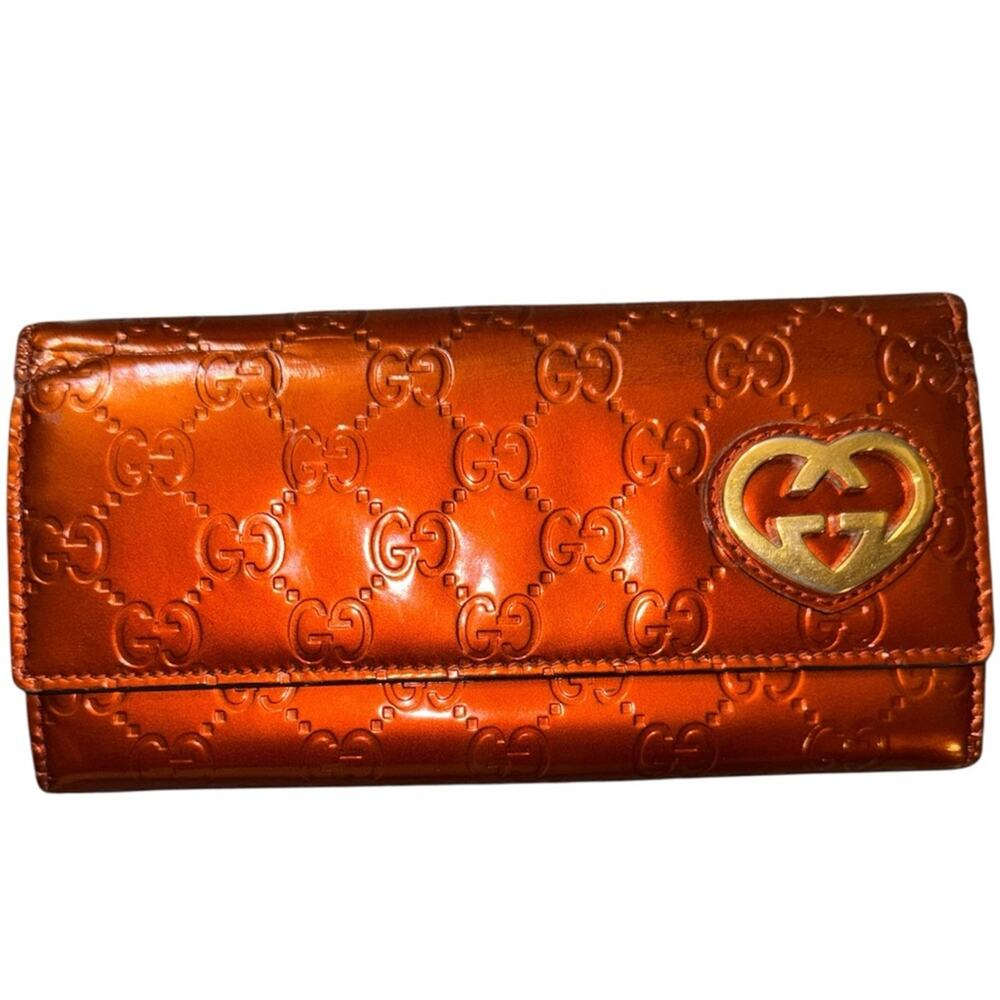 Gucci GG Embossed Leather Continental Wallet – Metallic Orange with Heart Logo